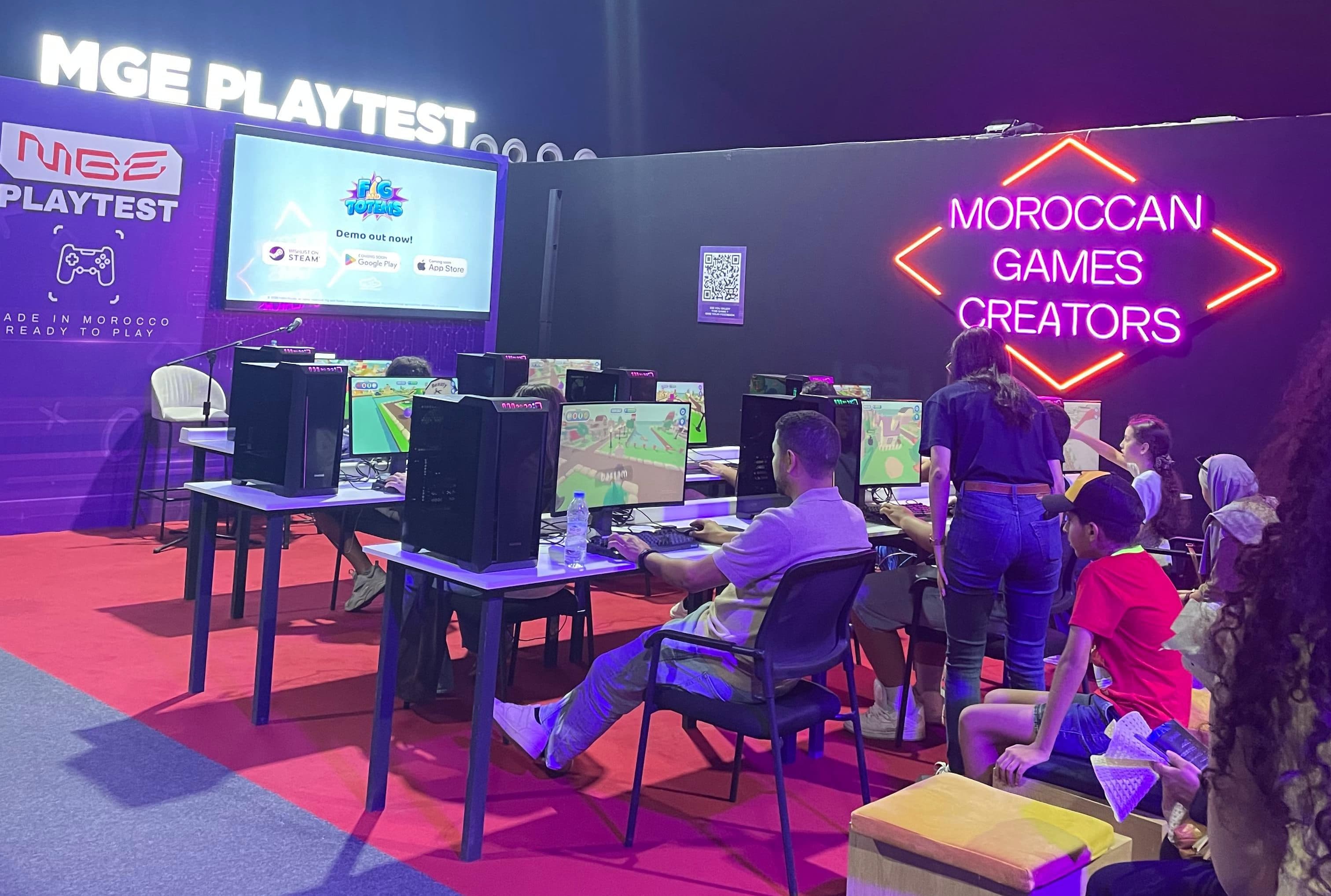 Players trying the Fig & Totems demo at the Morocco Gaming Expo 2026